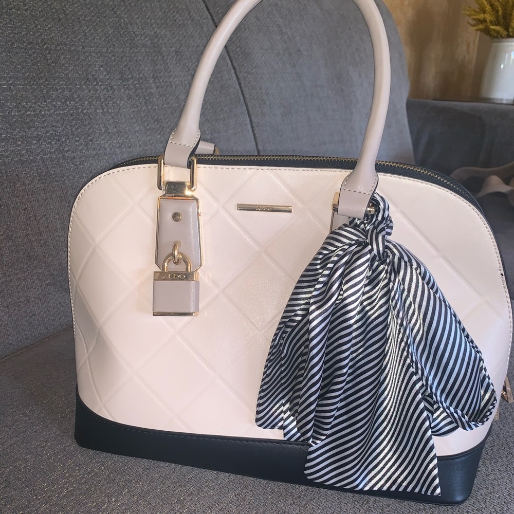 Mid size never been worn bag by Aldo